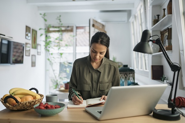 Young woman working at laptop